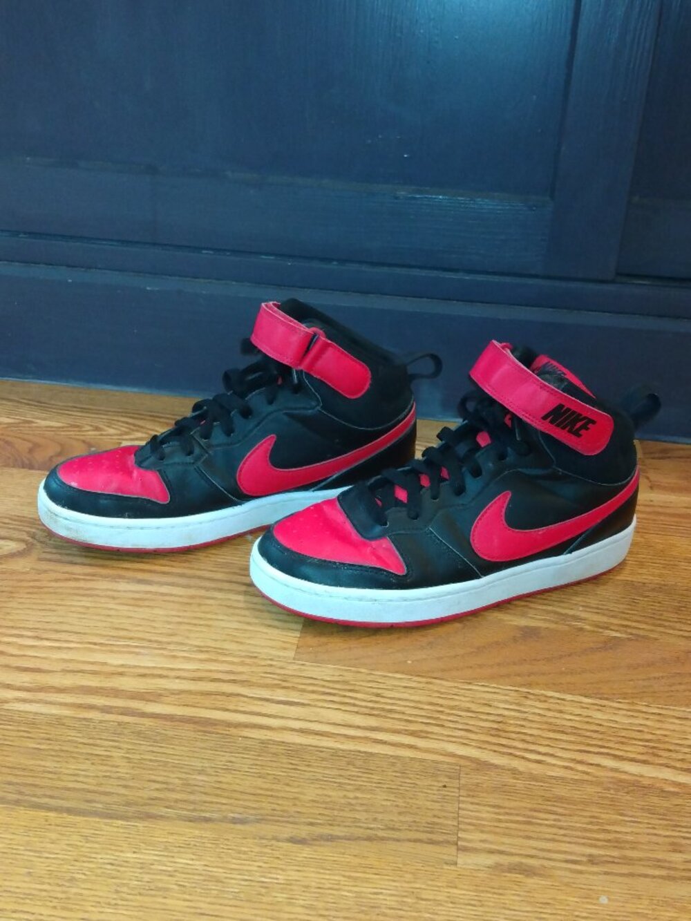 Boys Red, Black, & White Nike hightop sneakers size 6